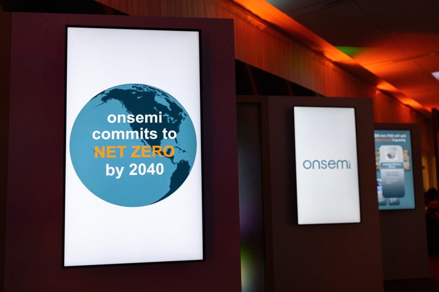 Photo of flat screen monitor showing text: onsemi commits to net zero by 2040 text